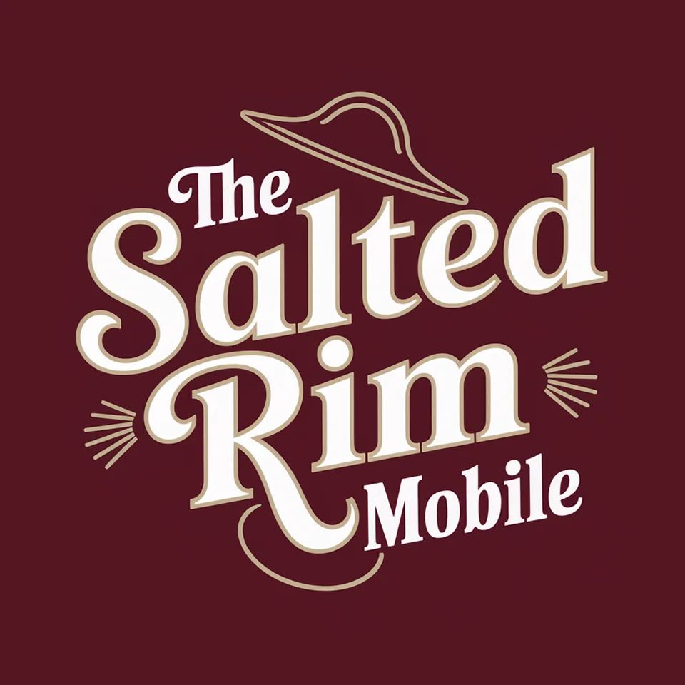 Logo of The Salted Rim Mobile with bold vintage typography and a cocktail glass outline, suggesting a mobile bar experience.
