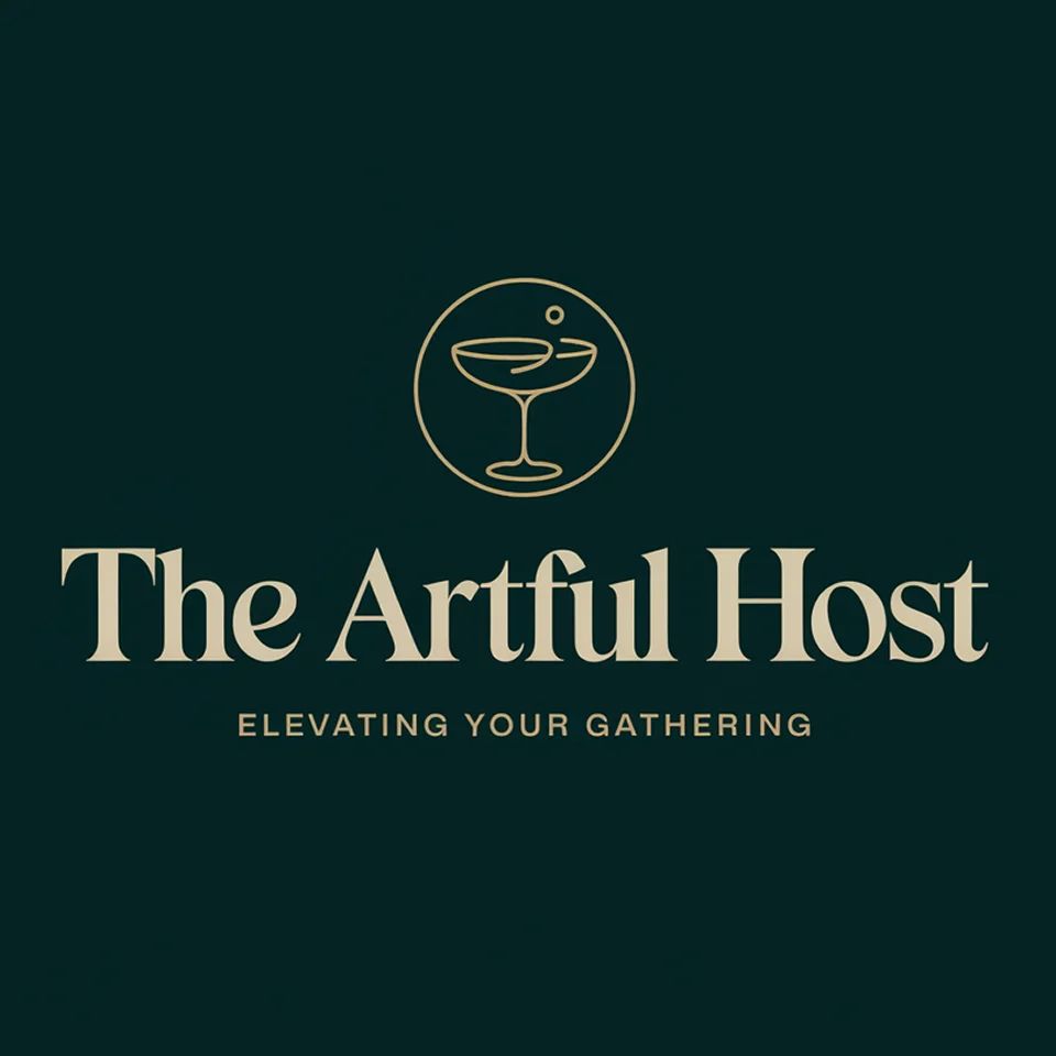 Logo of The Artful Host with a refined cocktail glass icon on deep green, suggesting elegant entertaining.