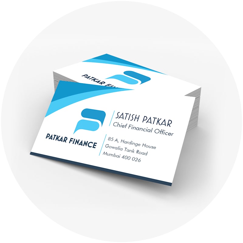 Printed business cards arranged on a tabletop