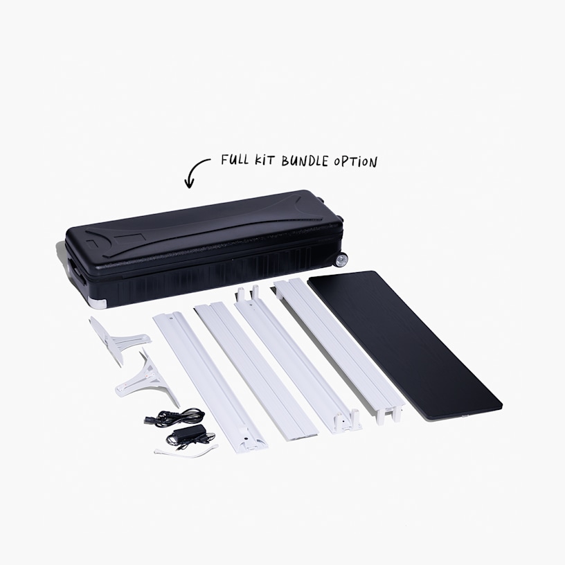 The complete lightbox display counter bundle, which includes the fabric, LED-lit frame, MDF tabletop and a wheeled carry bag for easy transportation.