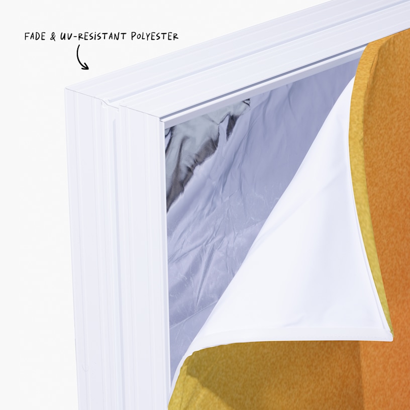 A closeup of the lightbox display counter's corner. An arrow points to the fade & UV-resistant polyester fabric.