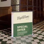 A lightbox display counter promoting a restaurant, displayed indoors.