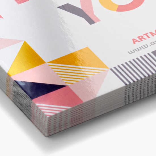 A close up of a postcard with Glossy front and back paper and texture