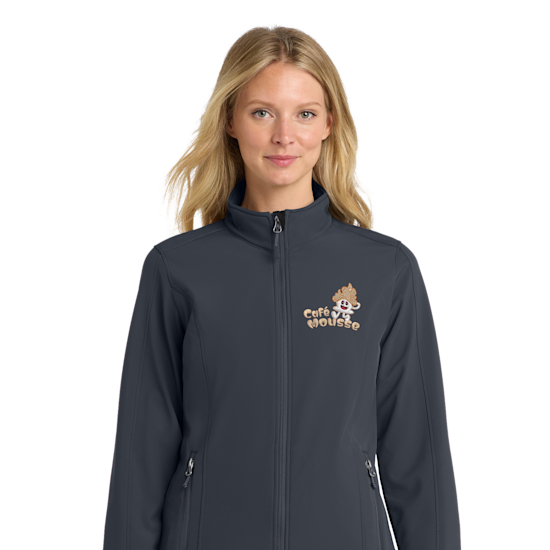 A person wearing a personalized fleece jacket while smiling.