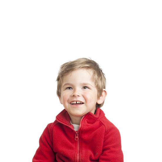 A child wearing a fleece jacket while smiling.