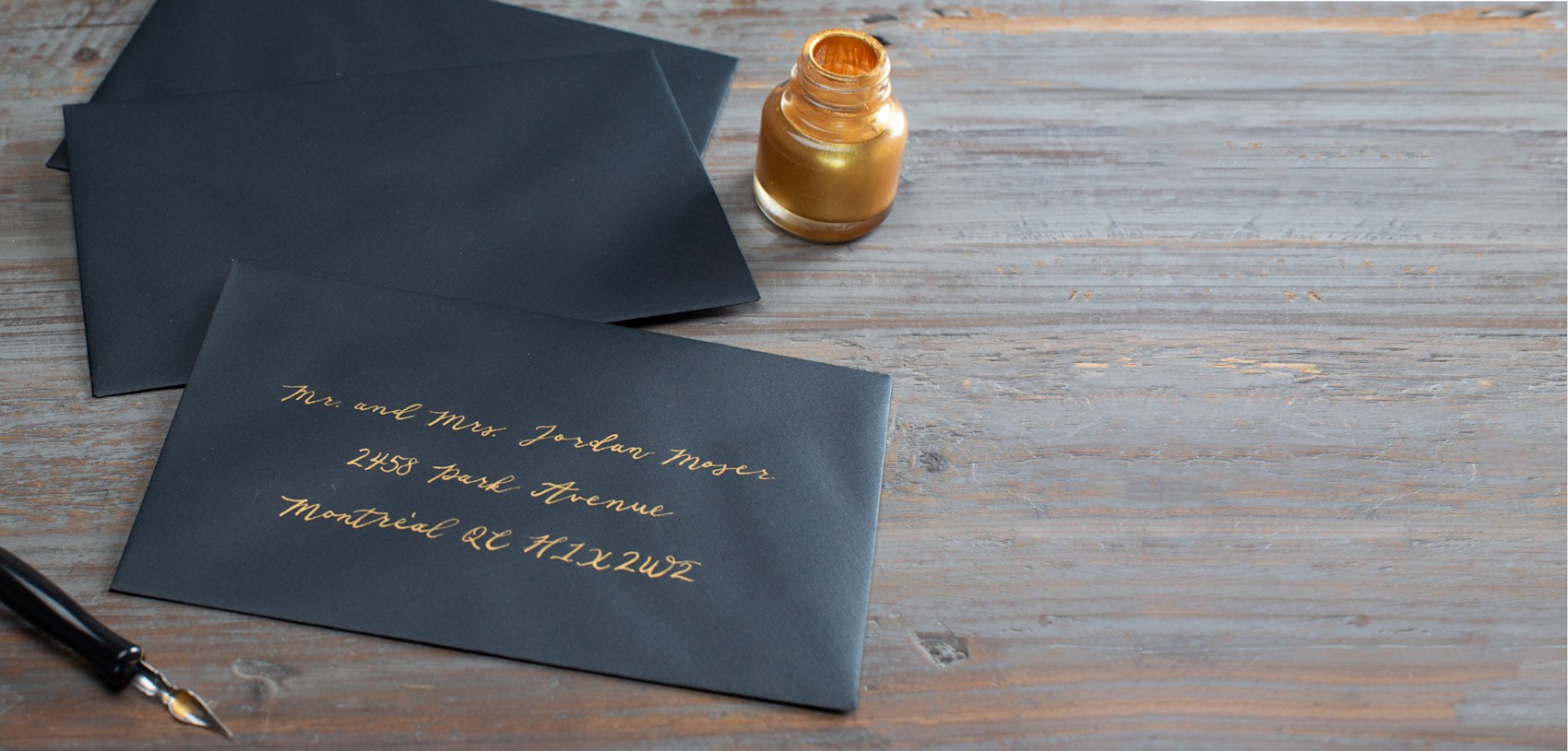 Larger version: navy envelopes with gold writing