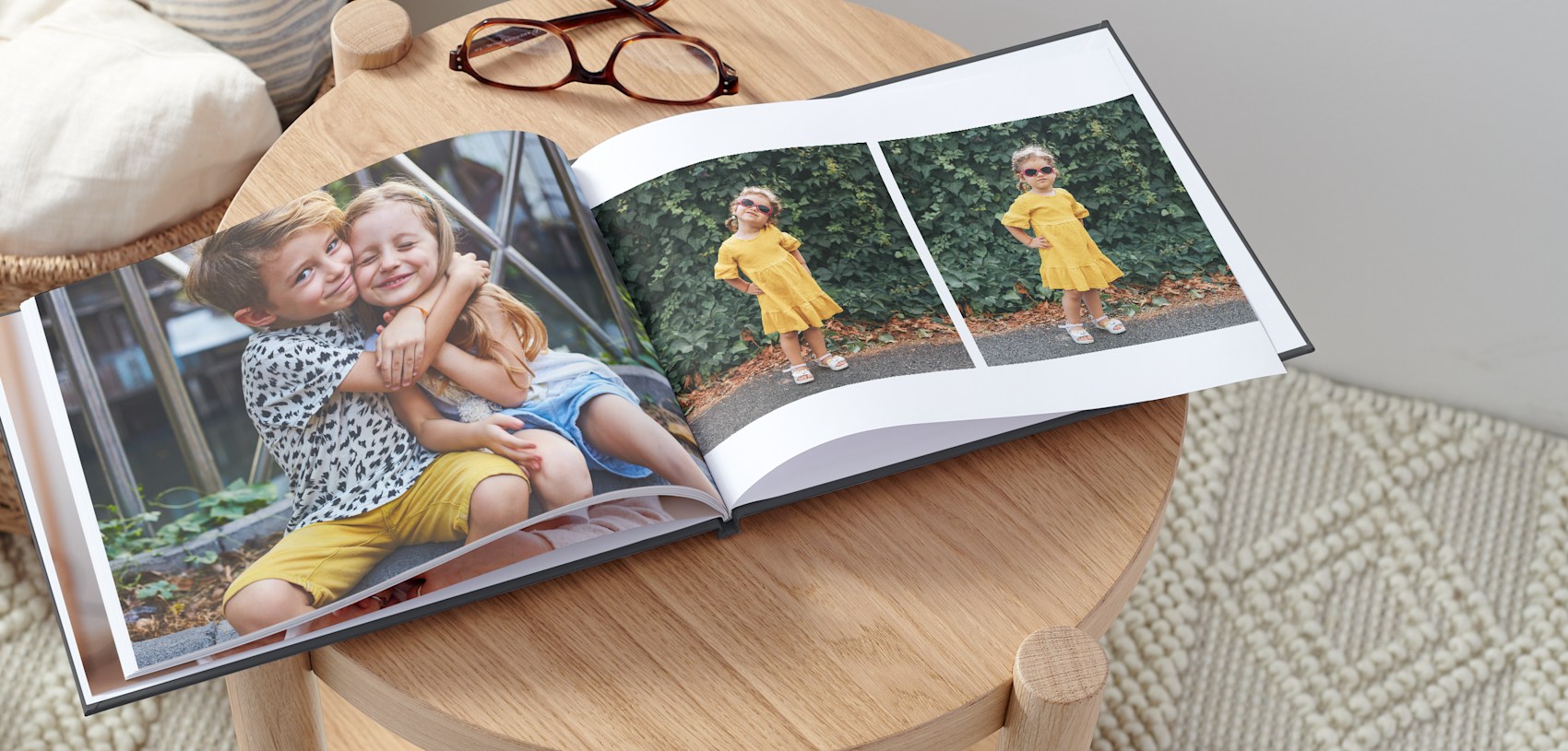 photo book with picture of two young children hugging