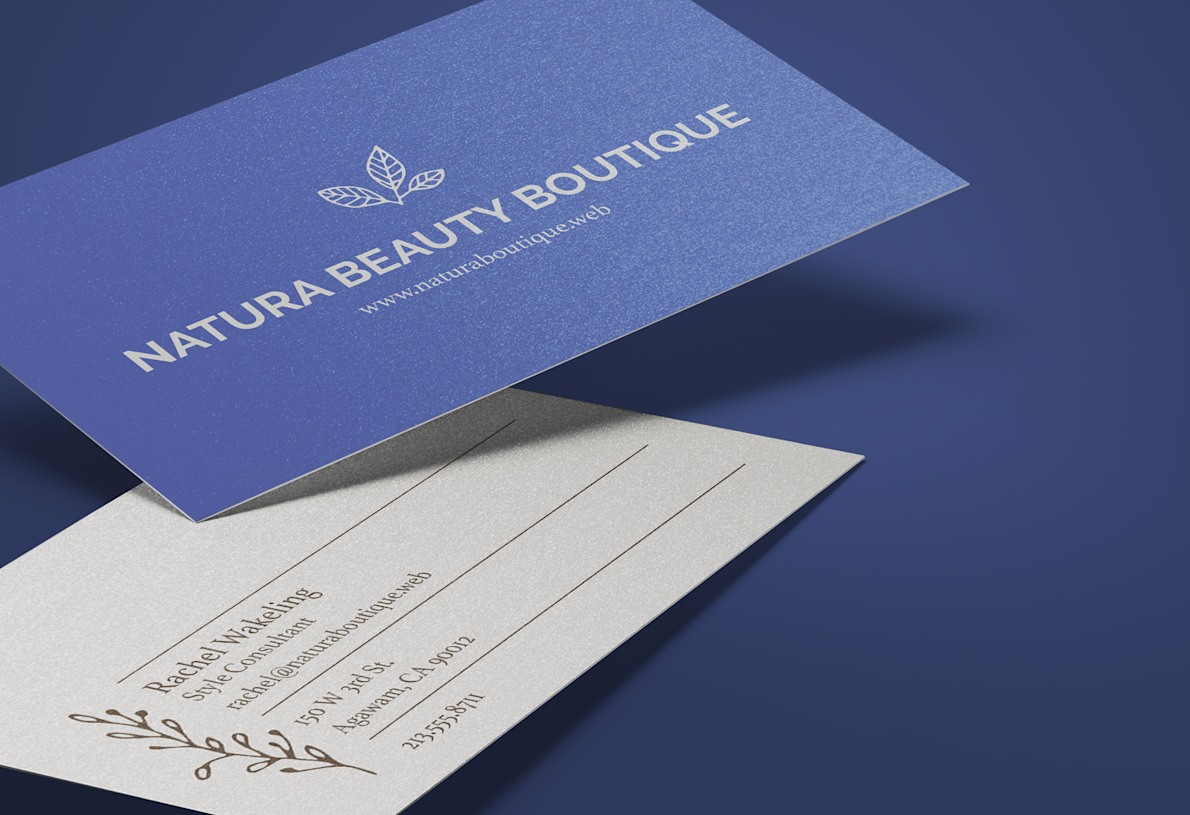 Larger version: A pearl business card promoting a salon business.