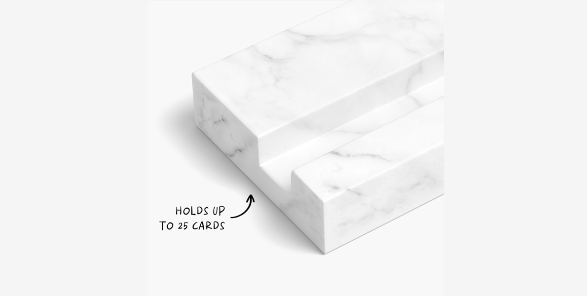 A label showing how many cards can the marble business card holder hold.