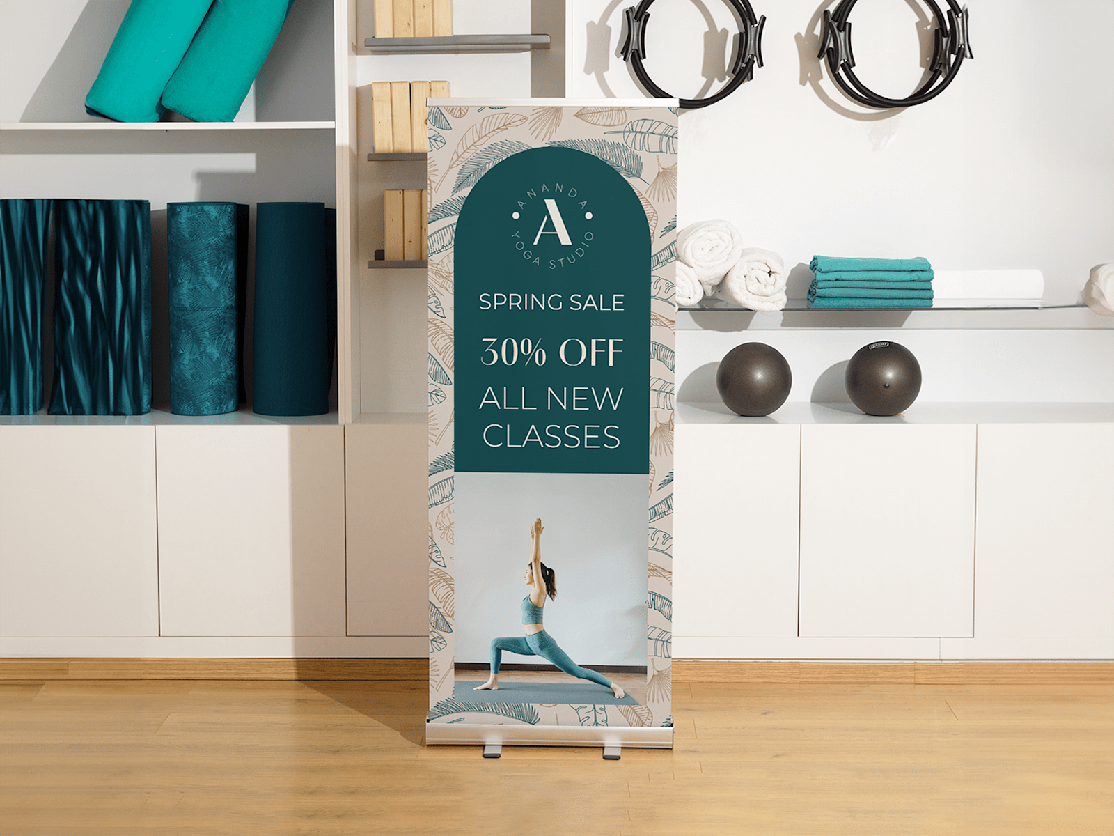 Pull-up banner advertising a professional trainer service, placed inside a sports shop. 