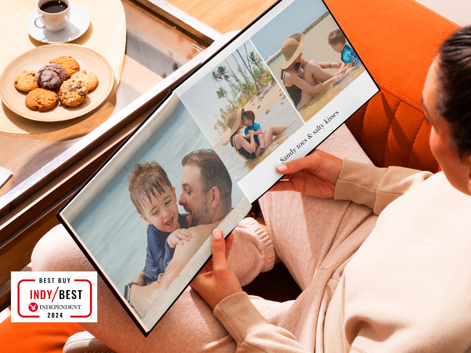 Larger version: A photo book, open to pictures of a family beach holiday. 