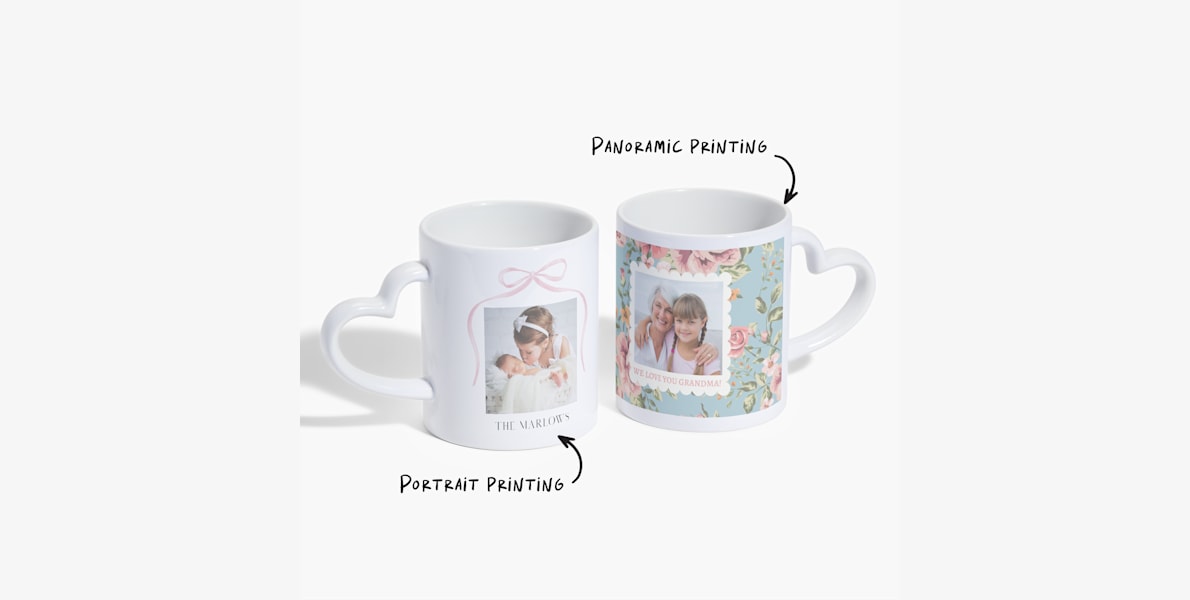 Two heart-shaped handle mugs, one printed with a family name and the other customised for a grandmother. A note indicates that both portrait printing and panoramic printing are available. 