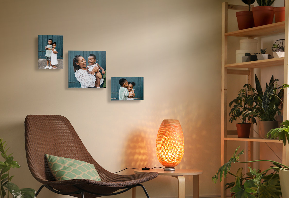 Larger version: 3 custom picture tiles displayed on a living room wall featuring family photos of a mom and her kids.