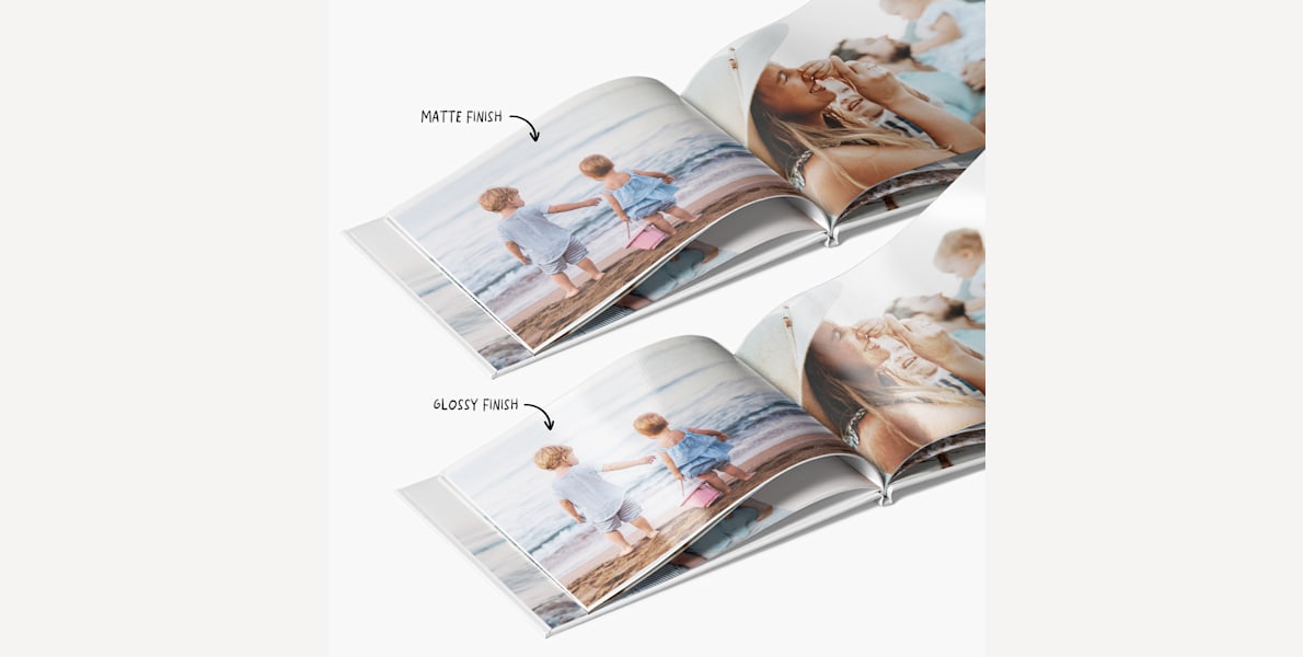 Two photo books open to pictures of a family at a beach, with a note that there are 2 paper finishes; matte and glossy.