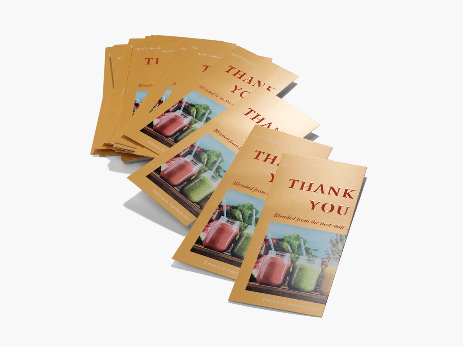 Larger version: A stack of embossed gloss rack cards, promoting a juice or smoothie business.