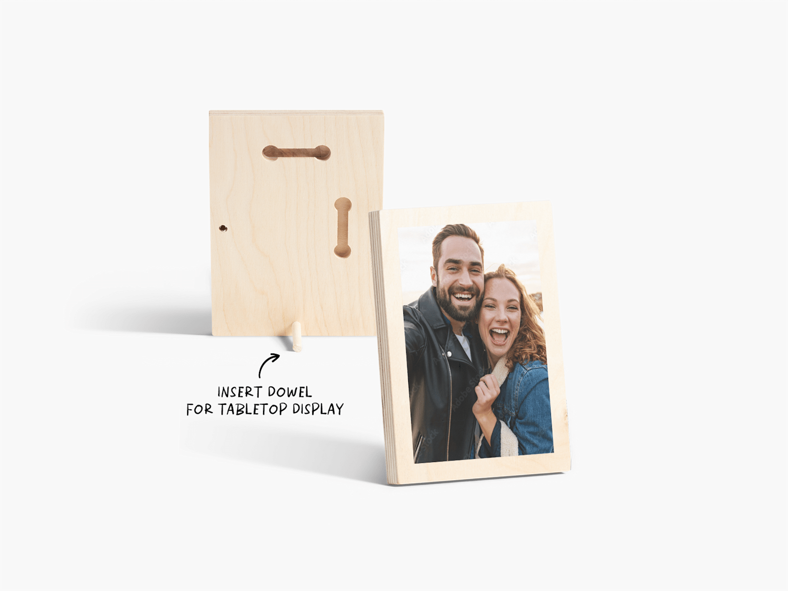 A front and back view of a tabletop wood print featuring a photo of a couple smiling, with a note that you can insert a dowel for tabletop display.