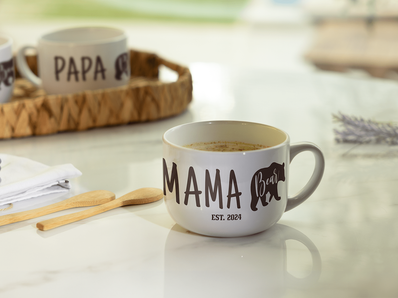 Larger version: Two sop mugs personalized for a mom and dad, with text that reads “Papa Bear” and “Mama Bear”.