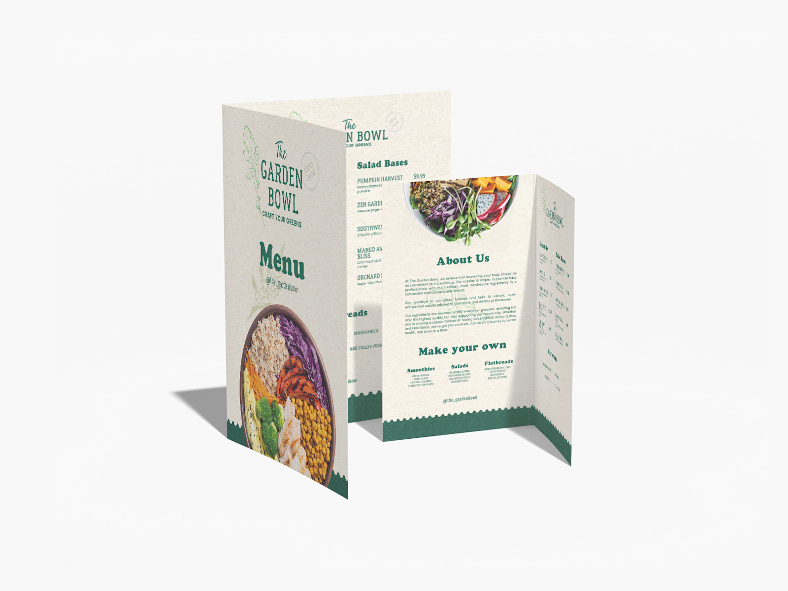 Small and large bi-fold menus for a health foods restaurant, propped up beside each other.