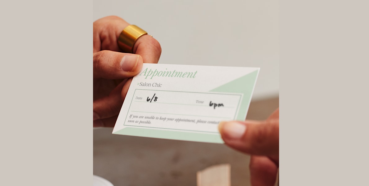 Larger version: An appointment reminder card for a salon, with a note that it’s easy to write on.