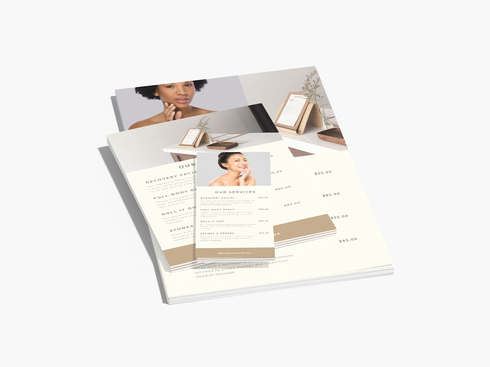 Several different sizes of flat menus, all listing out services at a spa.