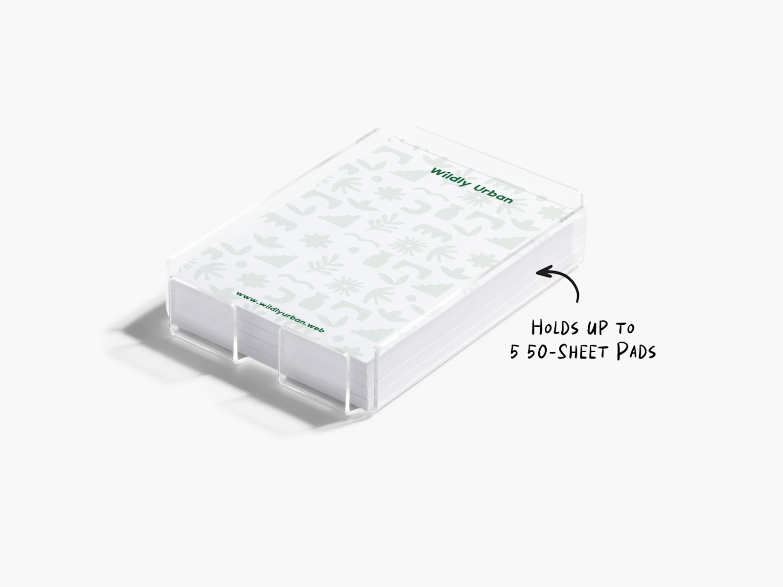 A closeup of an acrylic Post-it® holder, showing it has room for up to 5 50-sheet pads.