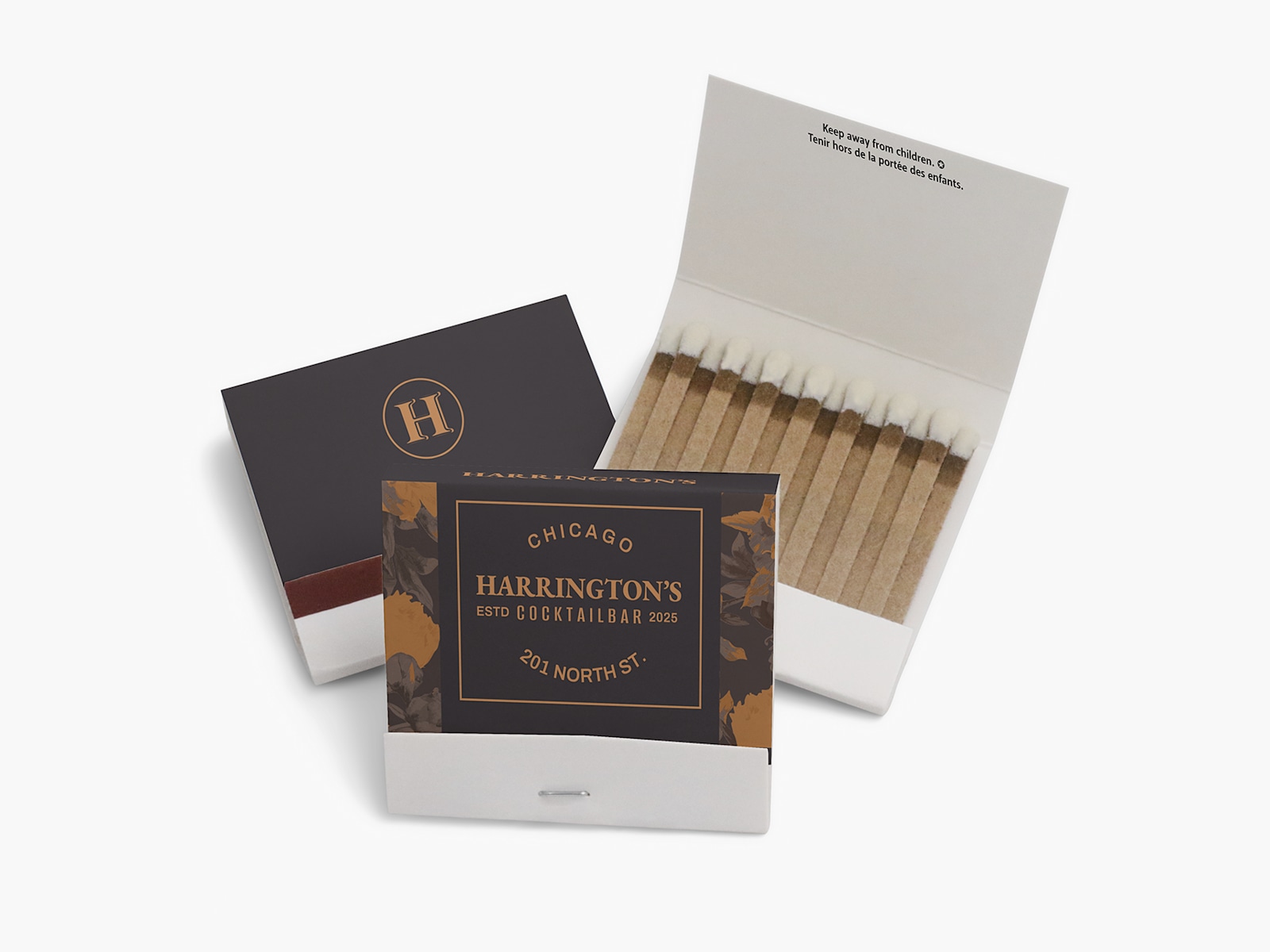 The front, back and interior view of a matchbook customized for a cocktail bar. 
