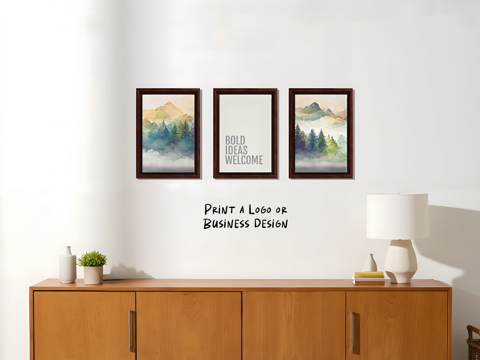 A trio of framed canvas prints hanging on a living room wall; one features the phrase, ‘Bold ideas welcome.’ 