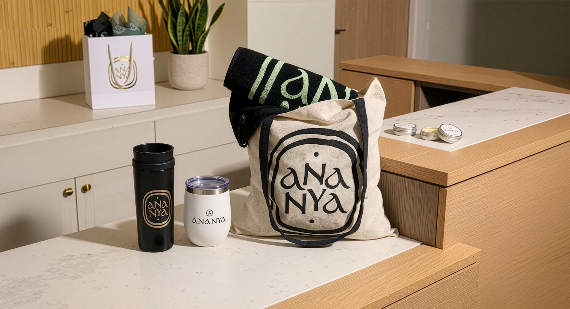 An assortment of custom bottles, pens, hats and keychains promoting a gym business.