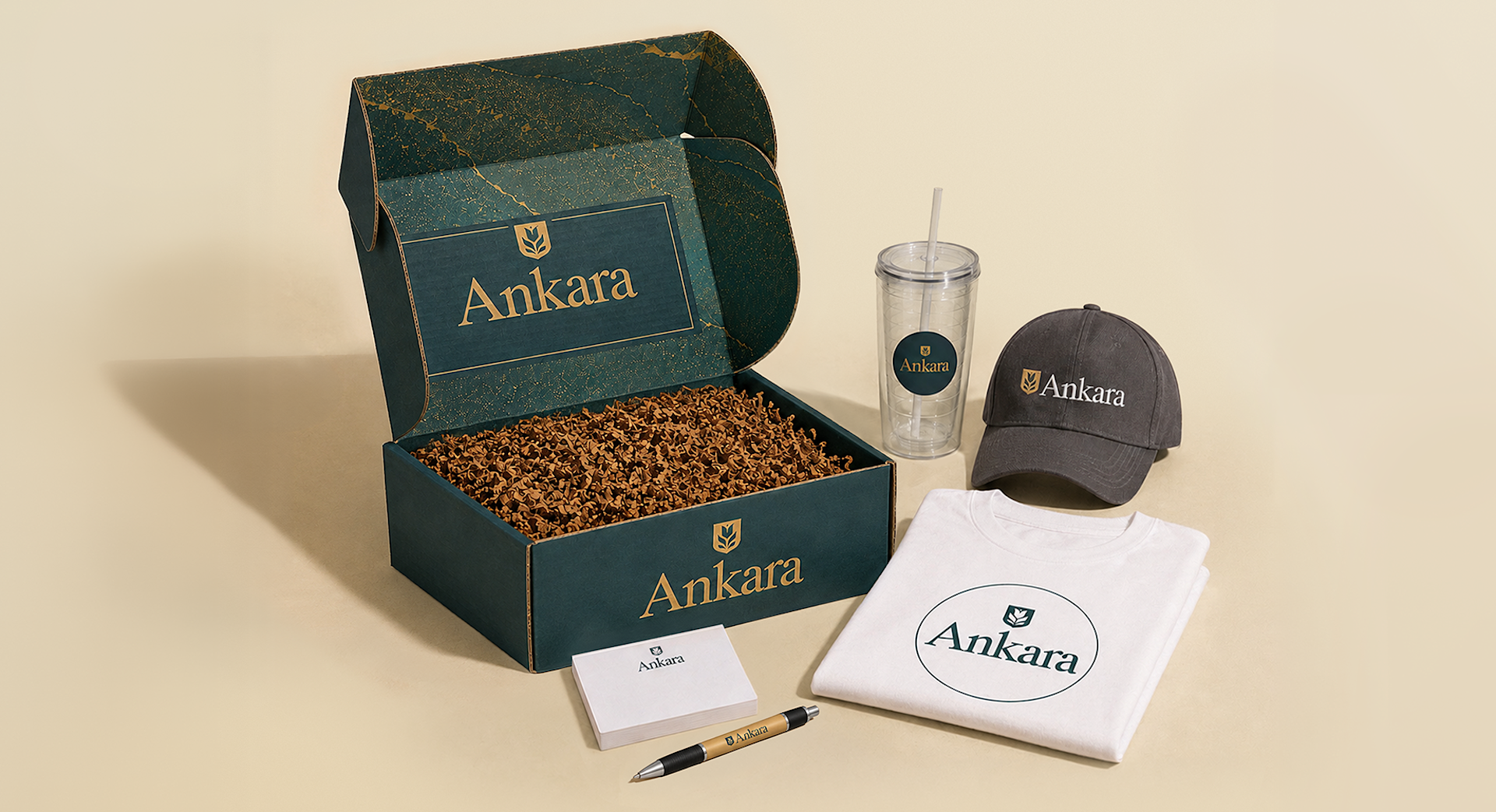 Five branded items arranged neatly alongside a mailer box with crinkle paper. 