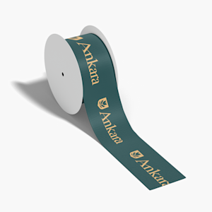 A roll of green custom ribbon.