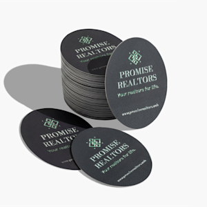 Two square magnets featuring a spa business.