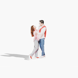 A life-size cutout of a man and woman dancing.
