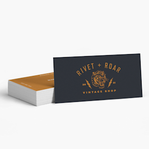 A stack of slim business cards for an event planner named Cheryl Ramsey.