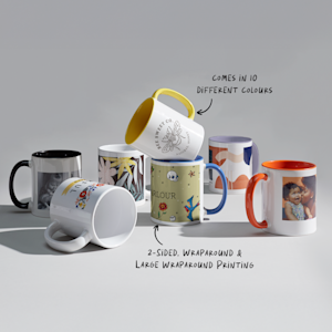 Two white and lilac mugs side by side, featuring a person’s monogram.