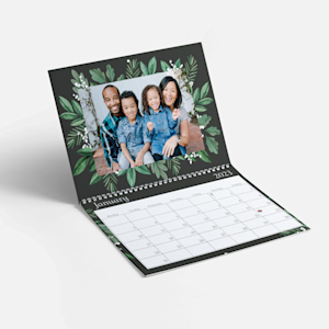 photo calendar showing young child and pregnant mother