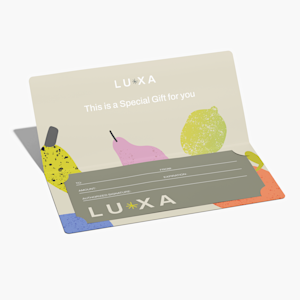A gift certificate from a health supplements company, tucked into a branded gift certificate holder.