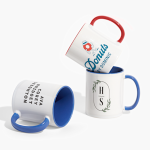 3 custom mugs with blue and red accent colors and various designs. 