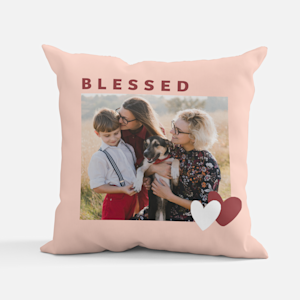 photo pillow with the words “blessed”