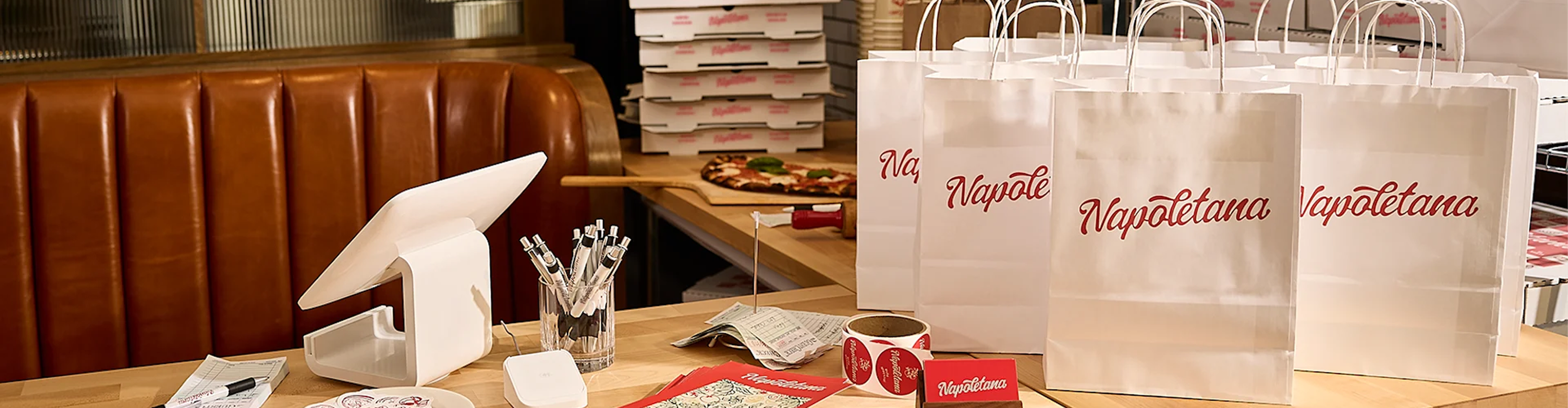 Paper bags promoting a restaurant.