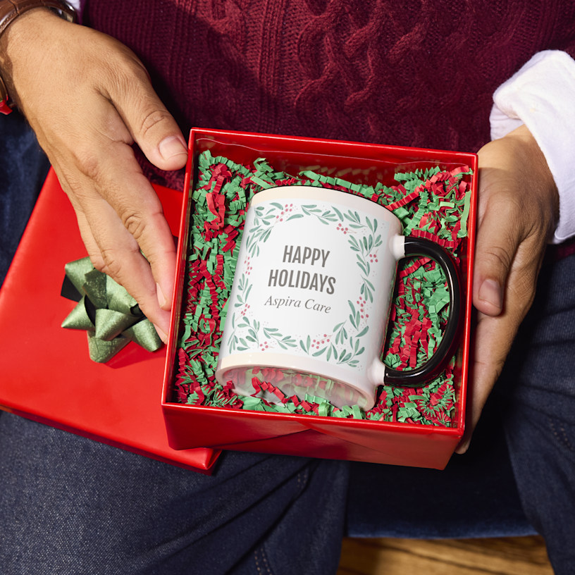 A custom pet mug and a personalised mug printed with a name, with a note highlighting the design options for custom mugs: wraparound printing and double-sided printing. 