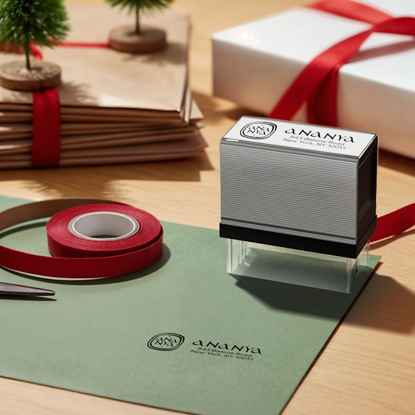 A small and a large self-inking stamp featuring the same design.