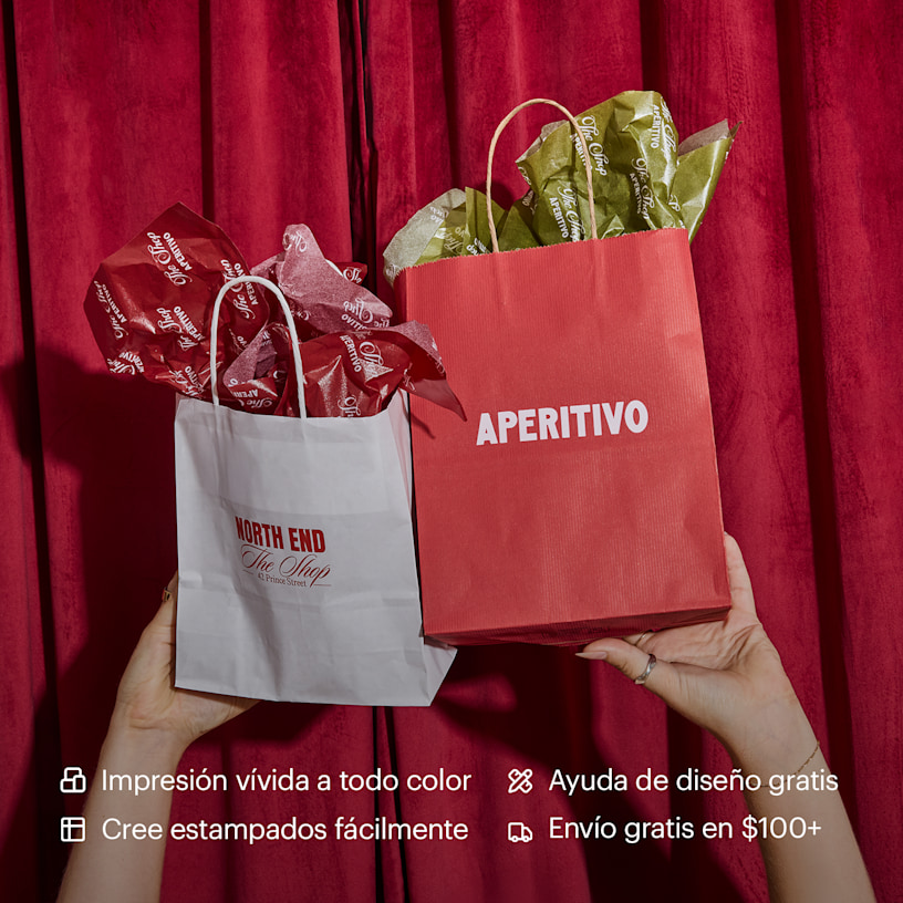 A pair of hands holding up two paper bags filled with tissue paper customized for an Italian restaurant. Highlighted benefits include full-color printing, free design assistance, free shipping and the ability to create your own tissue paper pattern.