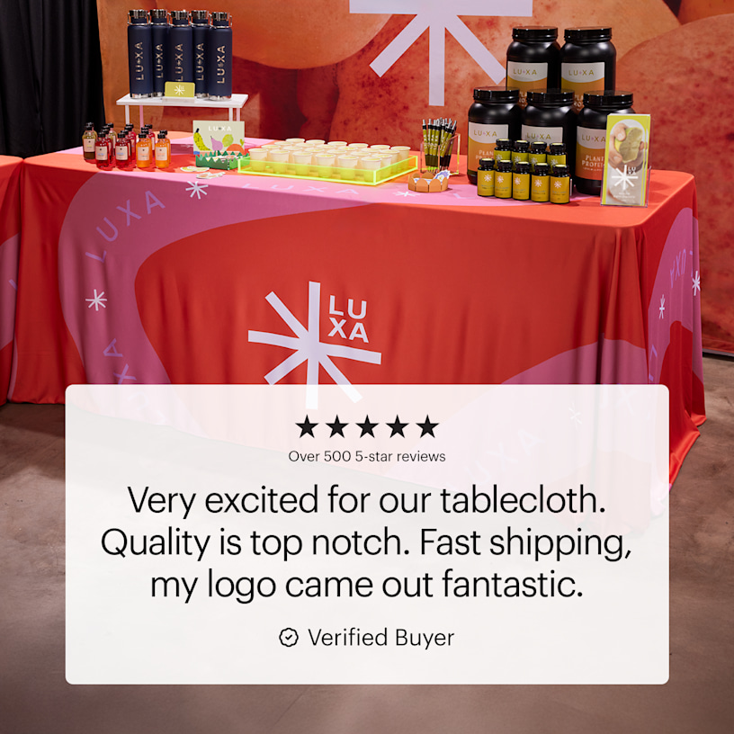 A custom tablecloth promoting a business named Luxa. It features a customer testimonial about top-notch quality and fast shipping.