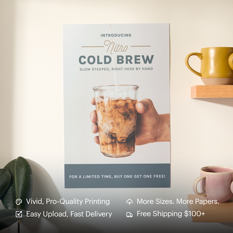 A bright yellow poster hanging on a brick wall promoting an art exhibition. Highlighted benefits include vivid printing, easy upload, more sizes and papers and fast, free shipping.