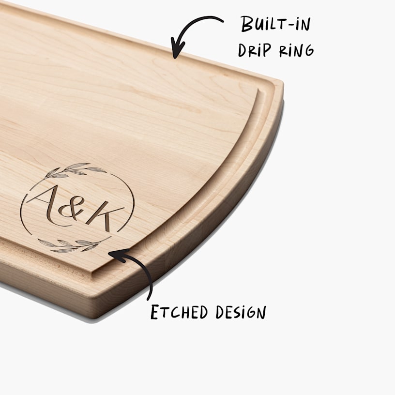 A maple wood cutting board customized with initials, with a note that the board features a built-in drip ring and etched design. 