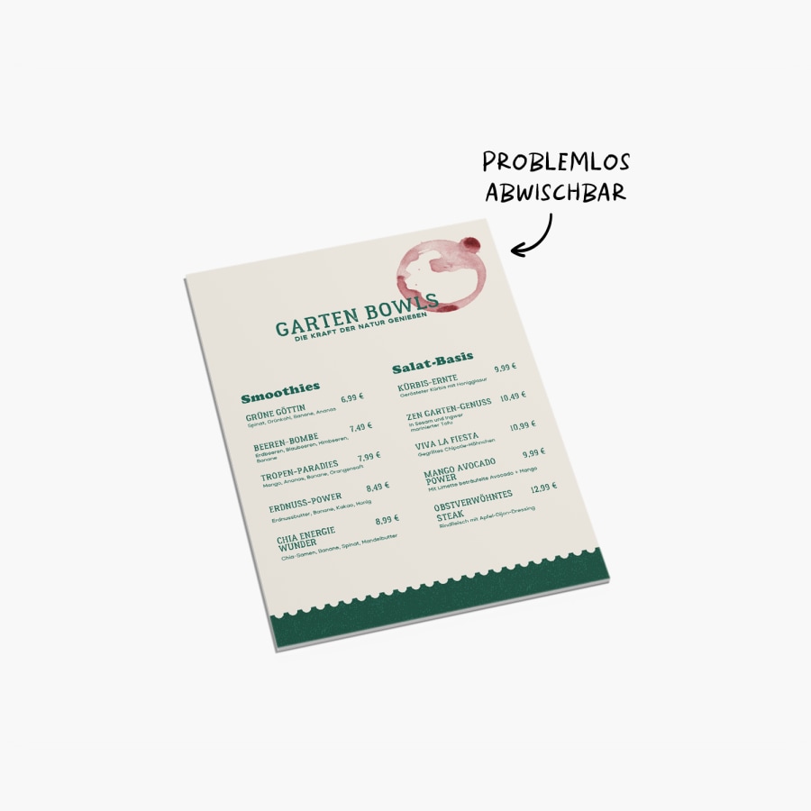 Eine wasserabweisende, biegfeste Menükarte, bekleckert, aber unversehrt, mit der Notiz, dass Flüssigkeiten leicht abgewischt werden können. 