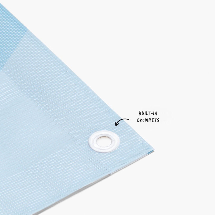 A closeup of the mesh banner's reinforced hem, which adds durability.