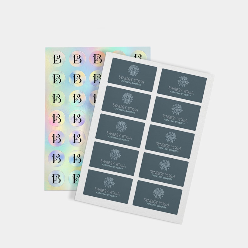 Two custom sheet stickers, side by side. One features holographic circle stickers with a logo, while the other features rounded rectangle stickers promoting a yoga business. 