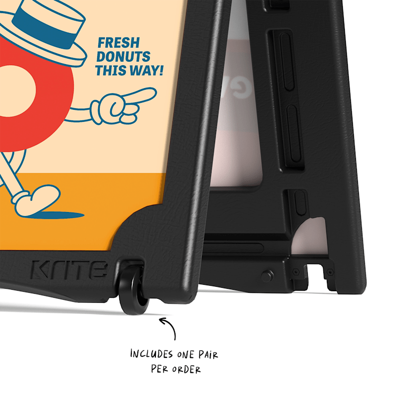 A closeup of a water-fillable A-frame's wheel. An arrow points out that one pair of wheels is included per order.