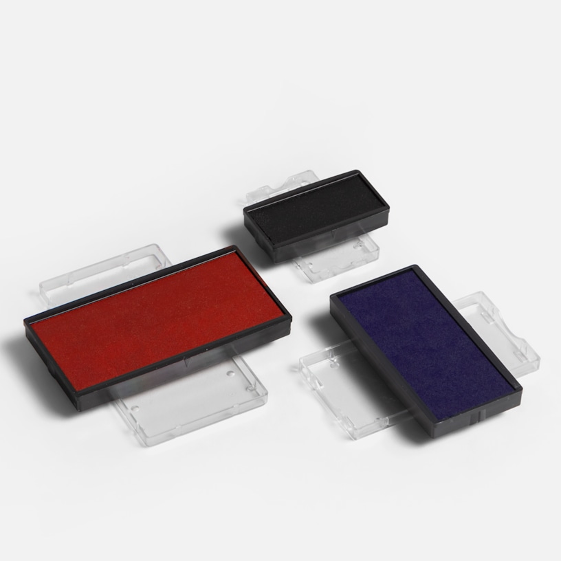 A small black, medium blue and large red rectangular replacement ink pad.